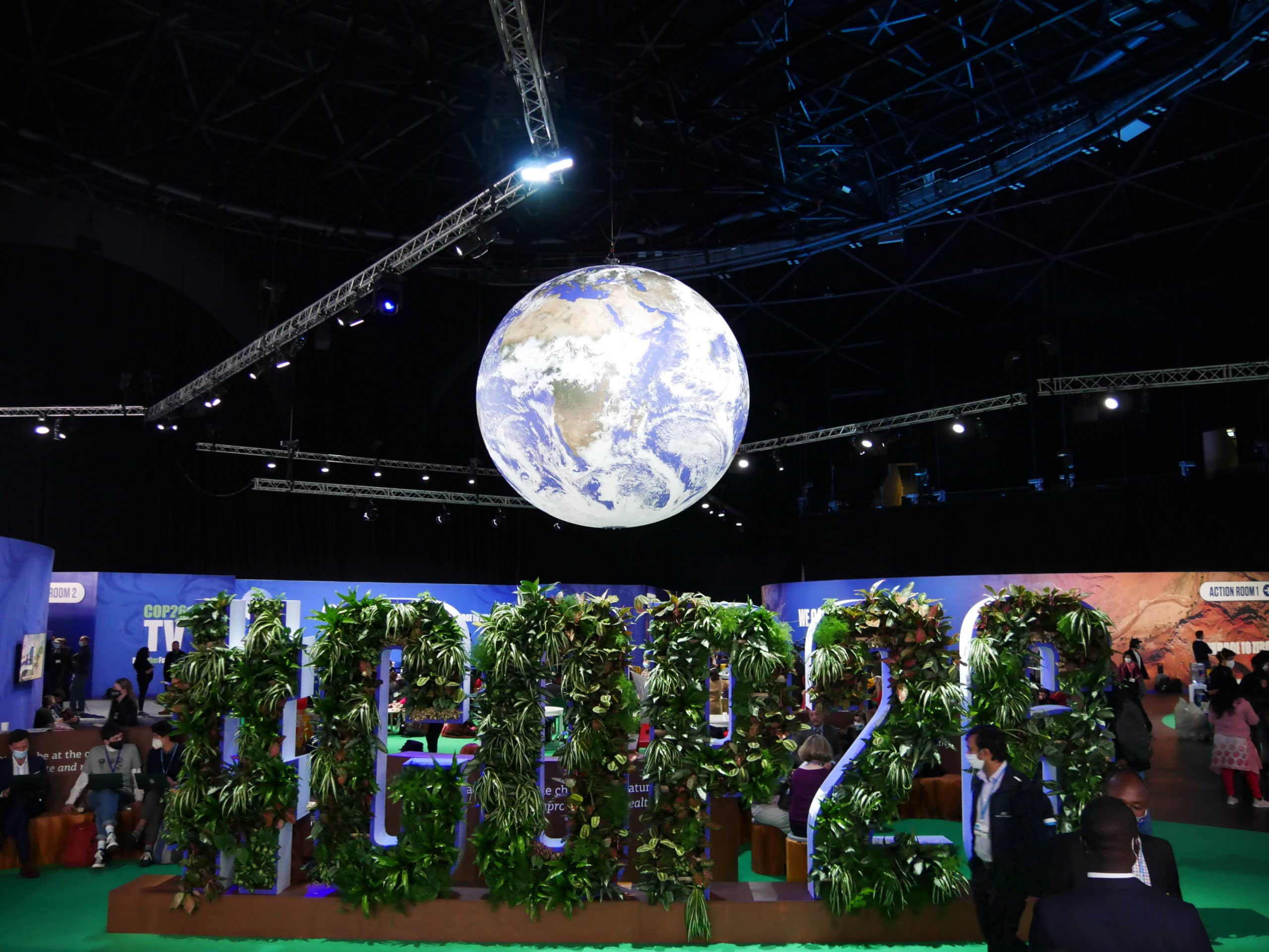 COP26 writing from plants above globe